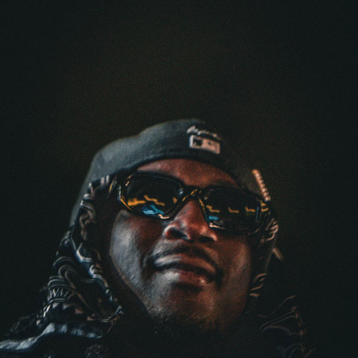 K Camp performing live on stage